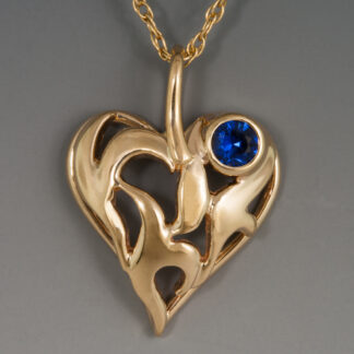 Pierced Heart Pendant with Sapphire