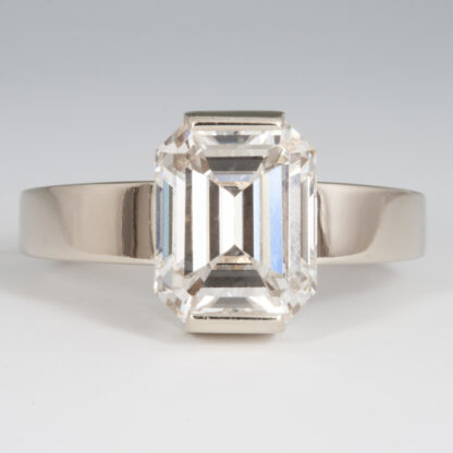 Ring, Diamond emerald cut 7.40x9.42x4.71mm, Tapered sculpted shank 14KW, sz 5.25