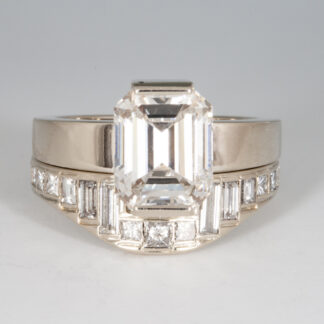 Diamond Wedding Set with Baguettes and Princess Diamonds and an Emerald Cut Diamond in 14KW