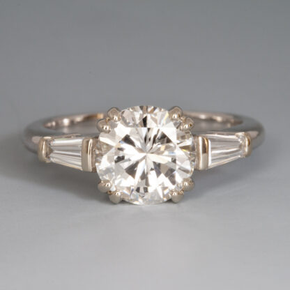 Ring, Diamond (supplied) 1.90ct 8.08mm, (2) Tapered Baguettes 5.2 x 2.8mm, E VS 1, .37ctw, 14kW size 6.5