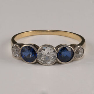 Ring, Diamond, Sapphire bezel set in platinum, 18KY shank, size 7.25, 1930's