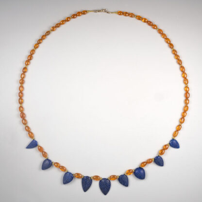 Necklace, Spessartite Garnet Lentils 141.34ctw with 9 Lapis Lazuli Leaf Pear shape and yellow Sapphires 3mm, 25"