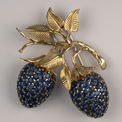 Pin,Tiffany & Co: 18KY Gold & Sapphire Berry Brooch, circa 1950, pave sapphires (2-2.6mm), hanging from berry branch in 18KY, double pin back