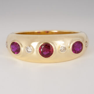 Ring, (3) Rubies (supplied), (4) Diamonds (supplied), tapered low dome ring, bezel settings, 18KY, size 6.75