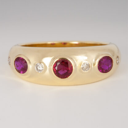 Ring, (3) Rubies (supplied), (4) Diamonds (supplied), tapered low dome ring, bezel settings, 18KY, size 6.75