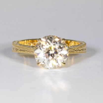 Engagement Ring, Diamond supplied (7.82mm 1.85ct. J SI1, Old European Brilliant) Engraved Cathedral shank, 18KY, sz. 3.5