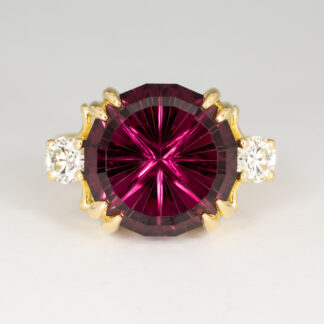 Ring, Umbalite Garnet 12.5mm 9.72ct from Malawi, Natural Starbrite cut by John Dyer, (2) RBC Ideal cut 3.8mm .43ctw D-G VS1, 18KY sz 6.5