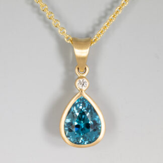 Pendant Blue Zircon Pear 8.6x6.5mm 2.96ct wDia .03ct 14KY