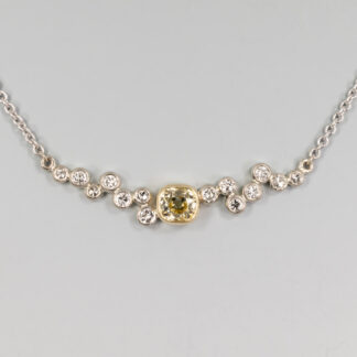 Necklace, Diamonds supplied: Center Yellow OEC,.45ct. 4.64x4.23mm, (14) 1.7 - 2mm @ .02ct each, @.28ctw, 14KY & W, 16" 1.3mm 14KW cable chain.