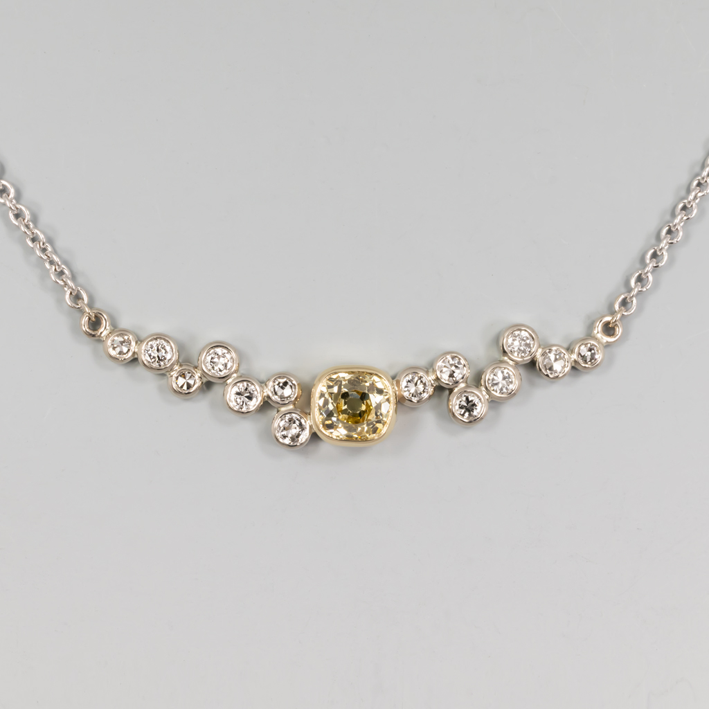 Necklace, Diamonds supplied: Center Yellow OEC,.45ct. 4.64x4.23mm, (14) 1.7 - 2mm @ .02ct each, @.28ctw, 14KY & W, 16" 1.3mm 14KW cable chain.