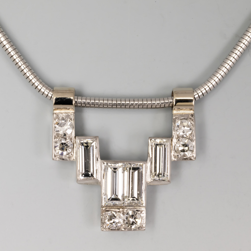 Necklace of assorted baguette and round diamond shapes in 14KW